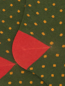 Women's long green warm cotton socks with polka dots