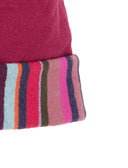 Berretto bambino rosa tinta unita con pom pon multicolor